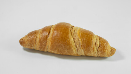 Croissants on a white background. Delicious, fresh croissants on a white background.