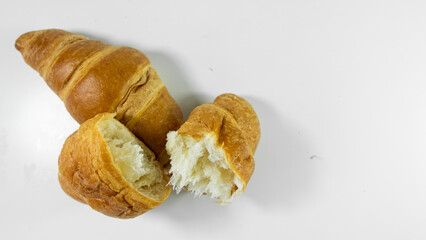 Croissants on a white background. Delicious, fresh croissants on a white background.