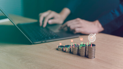 financial business growth 2024 concept. businessman calculate income and profit on investments, coin stack push target for creative and set up business objective target goal concept.