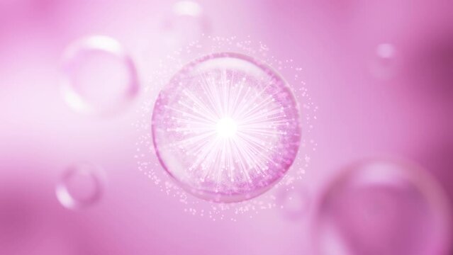 A large amount of pink serum bubbles come together as one to help restore the skin. The serum that combines together shines brightly