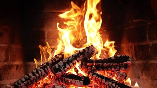 Fire in fireplace Watch This Fireplace Transform Your Evening.Cozy Fireplace Night .Burning fireplace will help you unwind in the perfect atmosphere