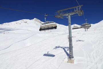 Fototapeta na wymiar Chair lift in Mayrhofen ski resort, Austria