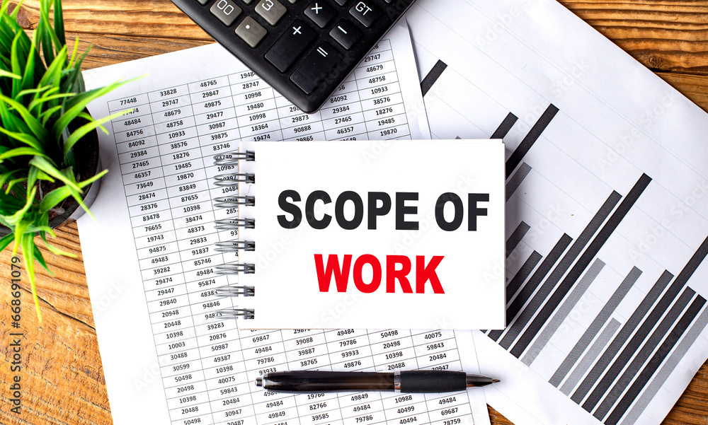 Poster scope of work text on a notebook with chart and calculator