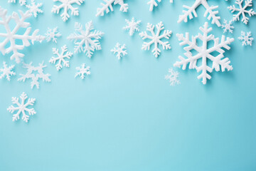 Fototapeta na wymiar Christmas snowflake on blue background.