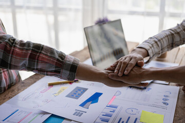 Two confident businessmen shaking hands during a meeting in the office Success makes deals in office briefings or negotiations. Happy male business partners shaking hands
