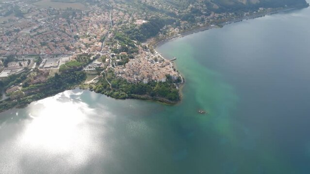Aerial view of the historic center of Anguillara, in the metropolitan city of Rome, Italy. The town is located on the shores of Lake Bracciano.
