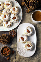 Amaretti Cookies. Gluten-free Italian Almond Cookies, cup of coffe and New Year decoration - 668700617