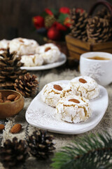 Amaretti Cookies. Gluten-free Italian Almond Cookies, cup of coffe and New Year decoration - 668700635