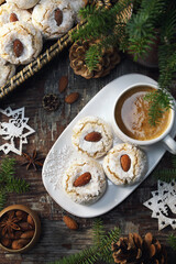 Amaretti Cookies. Gluten-free Italian Almond Cookies, cup of coffe and New Year decoration - 668700671