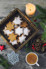 Christmas cinnamon cookies (spice-cake),  cup coffee and New Year's decoration - 668700851