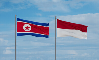 Indonesia and North Korea flags, country relationship concept