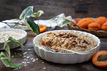 Apricot crumble from oatmeal, walnuts dressing - 668701413