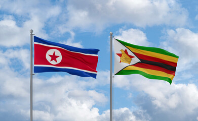 Zimbabwe and North Korea flags, country relationship concept