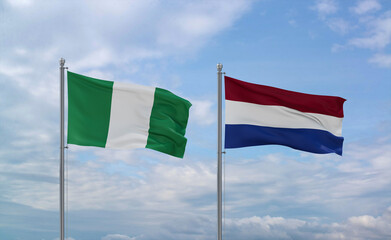 Netherlands and Nigeria flags, country relationship concept