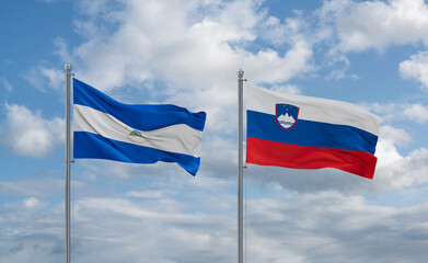 Slovenia and Nicaragua flags, country relationship concept