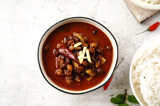 Kala Channa or Black chickpeas | Kerala Kadala curry served with rice and idiyappam