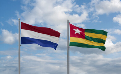 Togo and Netherlands flags, country relationship concept