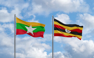 Uganda and Myanmar flags, country relationship concept