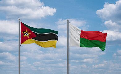 Madagascar and Mozambique flags, country relationship concept