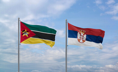 Serbia and Mozambique flags, country relationship concept