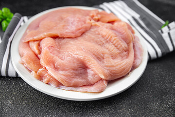 raw turkey fillet slice fresh poultry meat cooking meal food snack on the table copy space food background rustic top view 