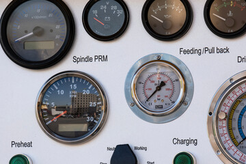 The control and control panel of the drilling machine.