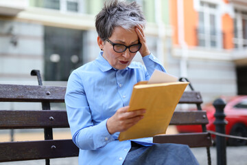 businesswoman grappling with a challenging problem, reflecting the common struggles in the professional world.