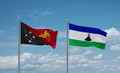 Lesotho and Papua New Guinea flags, country relationship concept