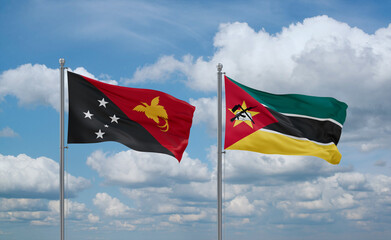 Mozambique and Papua New Guinea flags, country relationship concept