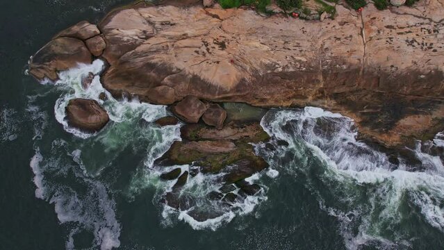 Drone Footage of Ipanema Beach in Rio De Janeiro in Brazil. The video is a timelapse over pedre do arpoador next to the Ipanema Beach.