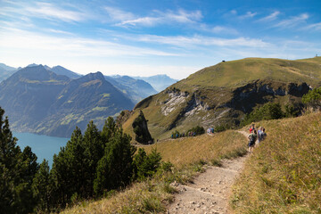 Hikers in the mountains, Stoos, Schwyz, Switzerland