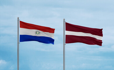 Latvia and Paraguay flags, country relationship concept