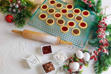 Fototapeta na wymiar Jam and ingredients for making tasty Christmas cookies.