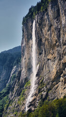 Fototapeta na wymiar Waterfall on a cliff