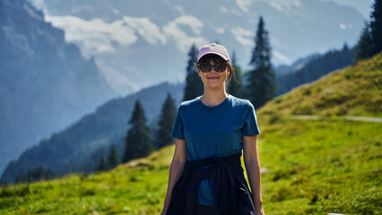 Young woman hiking in the Swiss Alps