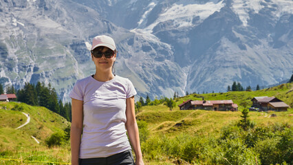 Young woman hiking in the Swiss Alps