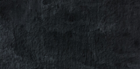 Obraz na płótnie Canvas Natural Dark black concrete grunge wall texture background, and backdrop natural pattern. Stone black texture background. Dark cement, concrete grunge background texture.