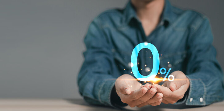 Zero percent commission and interest rate concept, businessman showing  zero percentage sign with Interest rate burden for special offer promotion and business strategy.