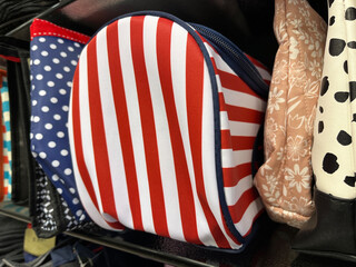 Red and White Striped Handbag on a Store Shelf