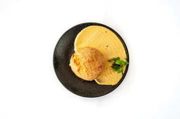 Bow de queujo cheese bun with truffle paste and cheddar cheese