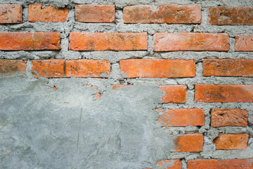 Brickwall with cement structure of the builiding house. Background and texture photo.