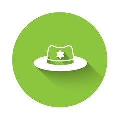 White Sheriff hat with badge icon isolated with long shadow background. Green circle button. Vector