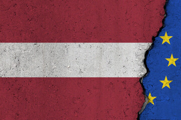 Latvia and EU flag cracked on a concrete background