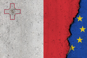 Malta and EU flag cracked on a concrete background