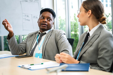 Group of business meeting and discussing strategy with startup project analysis finance,management.Success business people plan and brainstorm,marketing,idea,research,organization in office.Teamwork