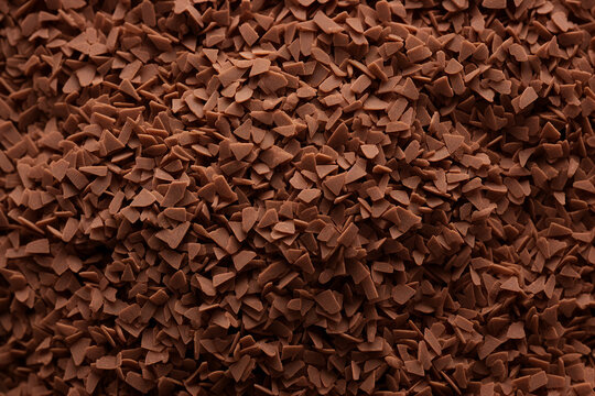 Close up generative AI picture of broken grated chocolate natural ingredient for desserts