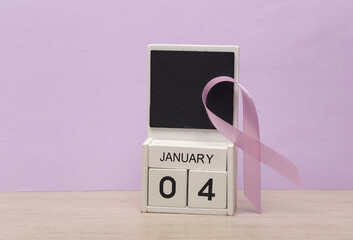 Purple awareness ribbon and calendar with date january 04