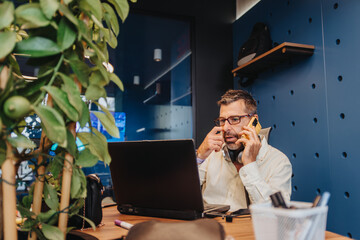 Diverse professionals collaborate in a creative co-working space, solving problems and completing work tasks. Their expertise contributes to successful growth in a technologically advanced workspace.