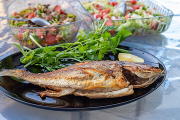 Sea bream fried fish. Nice dinner.