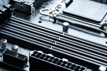 Four slots are connectors for installing DDR5 RAM on the motherboard of a modern computer. Photo...